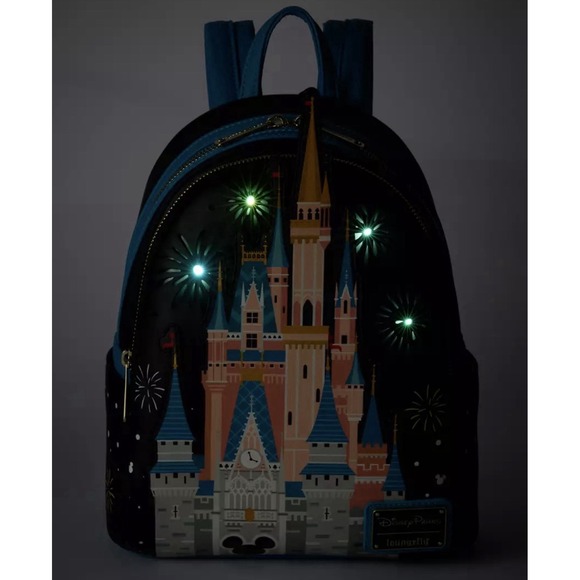 Loungefly Handbags - NWT Loungefly Disney Parks light Up Fireworks Cinderella Castle Backpack WOW!